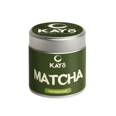 Green container of KAYO Matcha on a white background