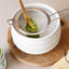 kayo matcha scoop for matcha sifting in a white bowl