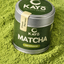 Container of Kayo Matcha on a bed of green matcha powder